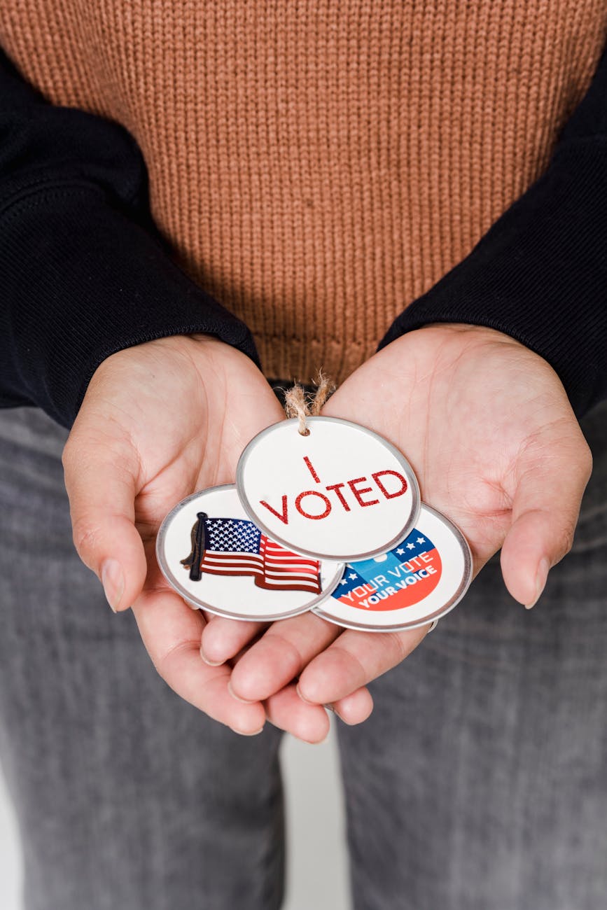 voting badges in hands