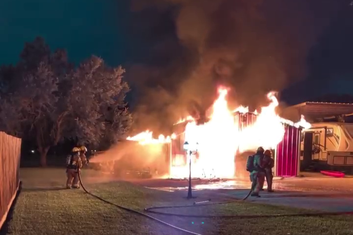 Fire Destroys Garage, Multiple Vehicles Near Alvin; Firefighter Hospitalized